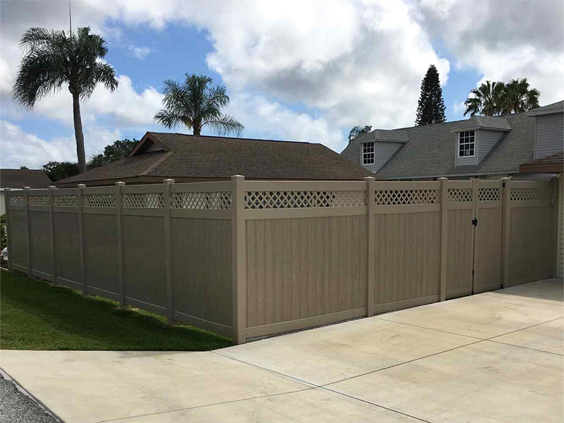 Residential lattice top vinyl fence in Sarasota Florida